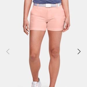Peach color Women’s UA links 4” shorts